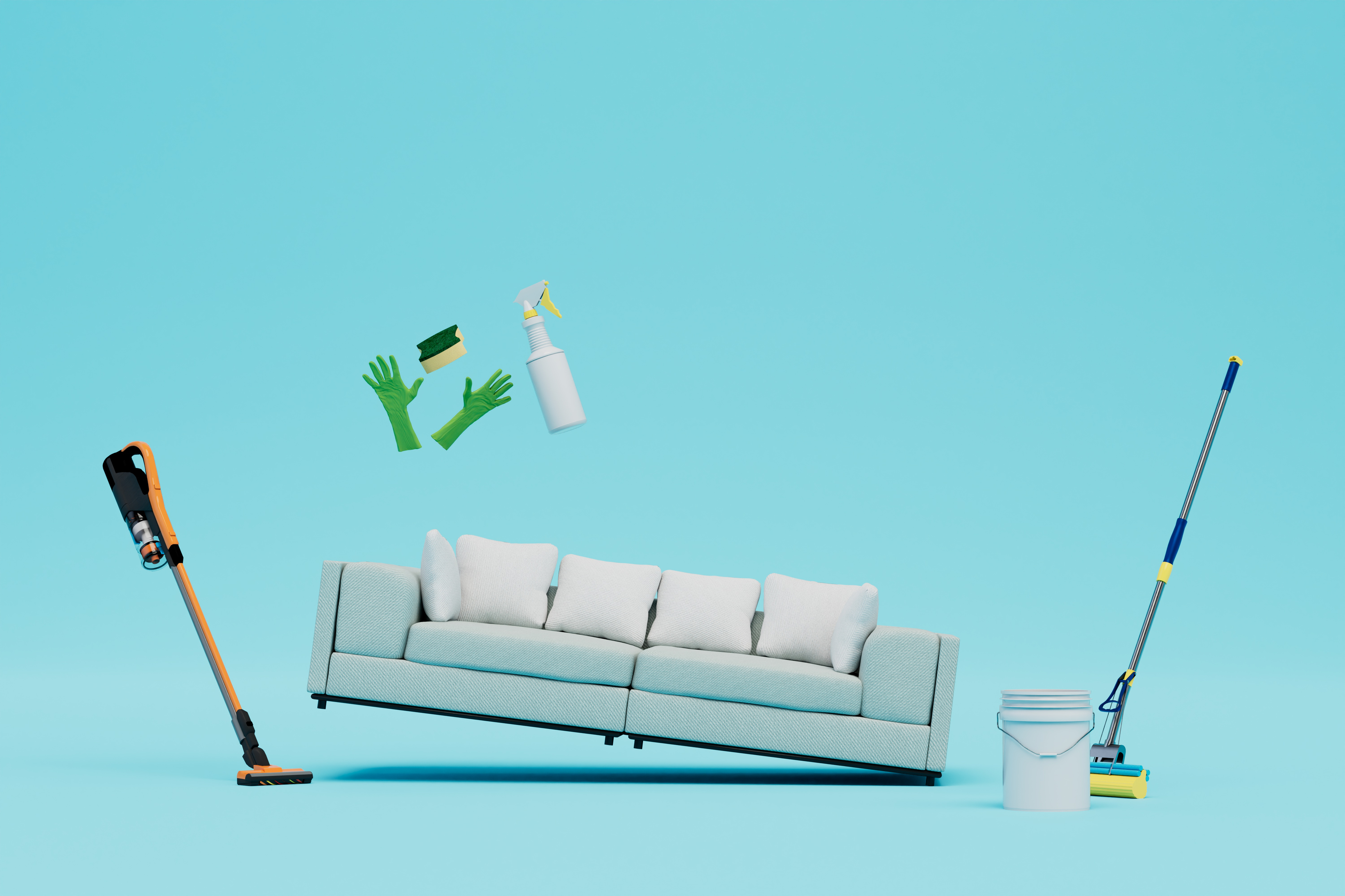 Living room cleaning setup with sofa and supplies